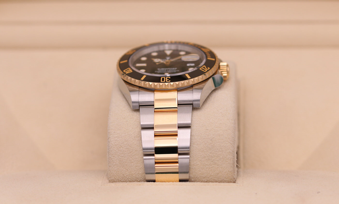 ROLEX SUBMARINER BLACK AND GOLD