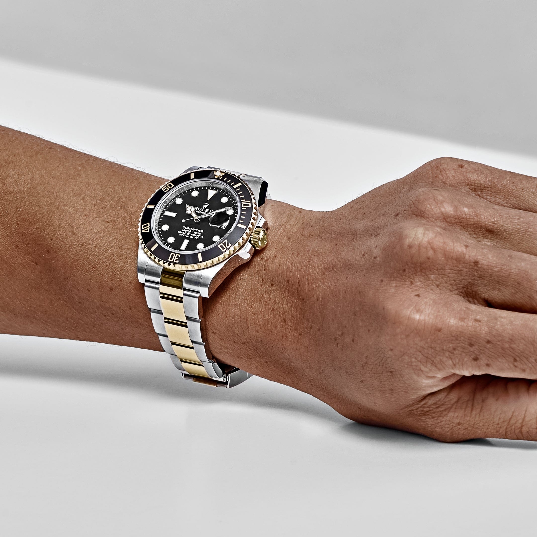 ROLEX SUBMARINER BLACK AND GOLD